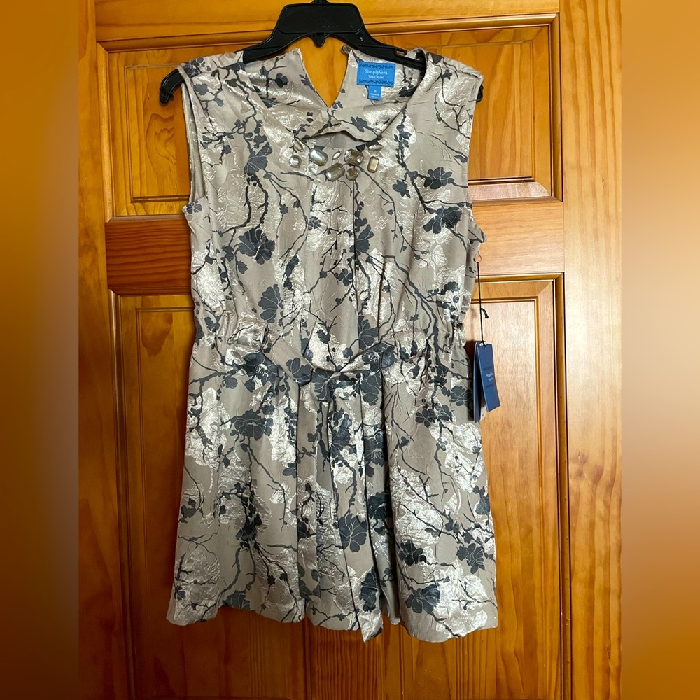 Never worn new with tags;  very pretty dressy tunic top.